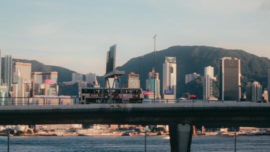 香港维港海旁高架双层巴士长焦摄影视频素材模板下载