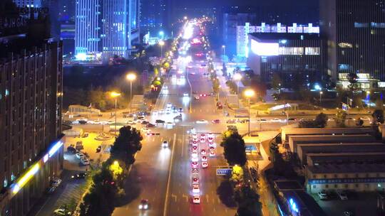 航拍夜晚金华城区道路街道路口交通车流夜景