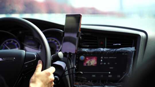 网约车司机驾驶室开车特写方向盘视频素材