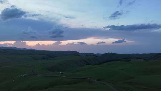 航拍中国新疆夏季山脉草原景观