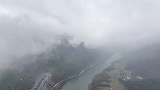 航拍云雾缭绕的广东清远连江畔高速公路视频素材模板下载