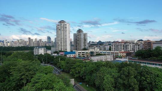 航拍城市雨后烟囱、云、建筑群