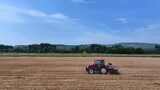 农村农民农业土地粮食航拍拖拉机播种玉米高清在线视频素材下载