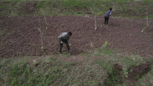 中国西部四川大凉山春耕农民劳作耕地航拍视频素材模板下载