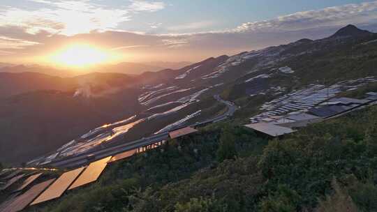 航拍高铁穿越山地光伏场