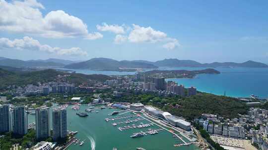 海南三亚航拍蓝天白云三亚湾城市凤凰岛海洋