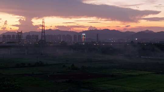 夕阳电塔城市航拍