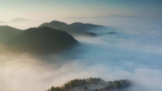 航拍高山群山山峰之间云雾云海