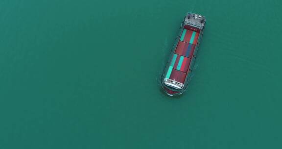 航拍深圳港附近海面货轮缓慢行驶