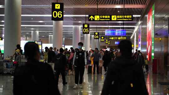 机场行李提取处行李转盘旅客人群乘客人流量
