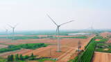 航拍麦地里的风车-风力发电新能源高清在线视频素材下载