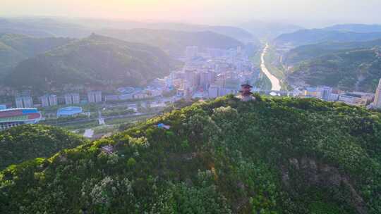 延安宝塔山与城区晚霞夏日航拍-4k宣传片