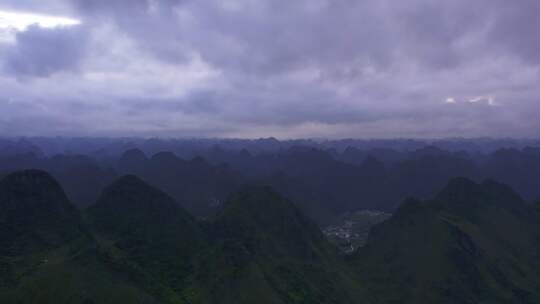 航拍阴天山峰喀斯特地貌