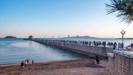 青岛海边延时日落夕阳航拍