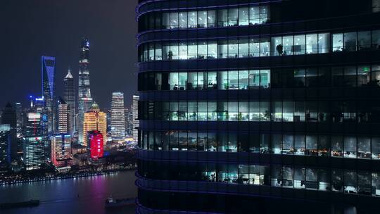 航拍上海商务楼白领加班忙碌夜景