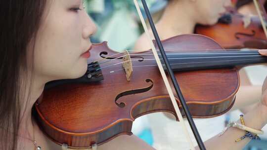 美女拉小提琴乐队演奏乐器表演庆祝庆典开业视频素材模板下载