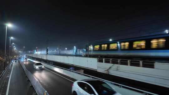 夜晚跟随拍摄一列南京地铁驶出中华门站视频素材模板下载