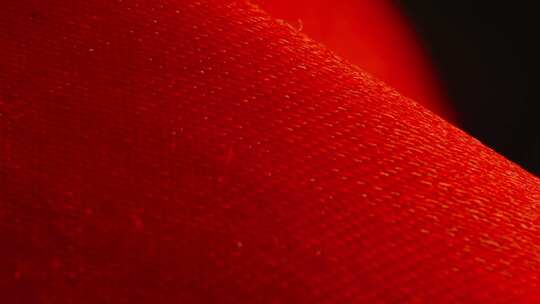红色丝绸绸缎微距摄影特写黑红背景