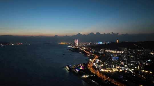 厦门环岛路夜景航拍海滨城市风光双子塔晚霞