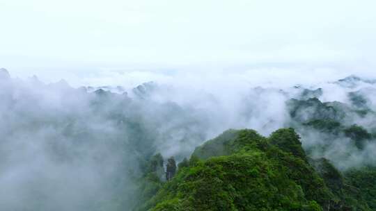 航拍大自然山林间的巍峨山峰俯瞰4k素材