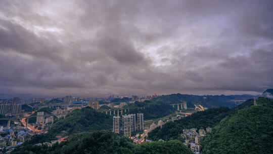 城市傍晚雨后日转夜延时