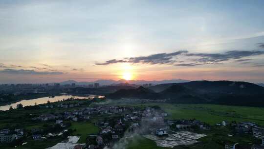 航拍夕阳晚霞河流村落