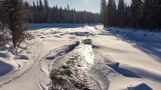 阿勒泰禾木冬季冰雪河流航拍自然户外风景