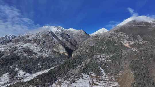 航拍川西贡嘎山乡高山森林雪景风光