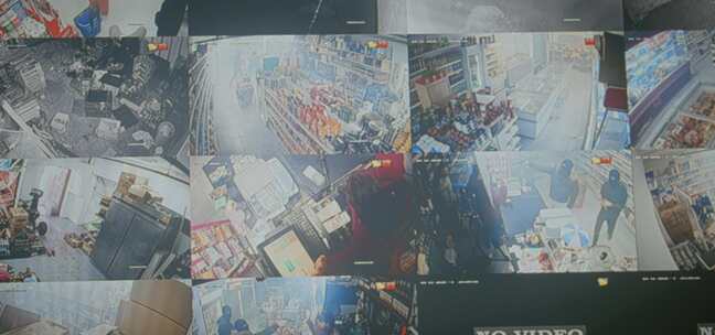 武装人员通过监控摄像头抢劫超市