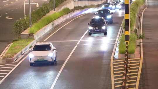 夜晚快速路隧道口车流马路行车亮化