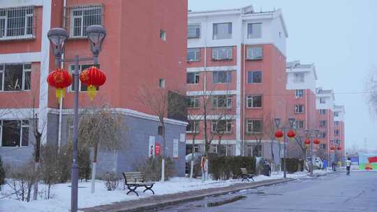城市居民小区下雪雪景视频素材模板下载