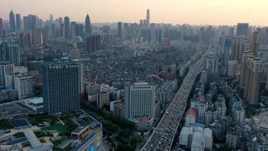 武汉金桥航拍马路车流城市高楼夕阳