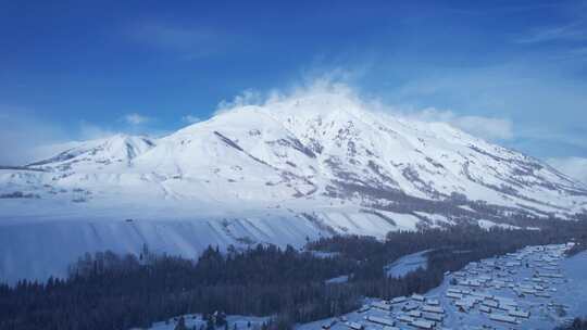 雪山森林河流村庄航拍