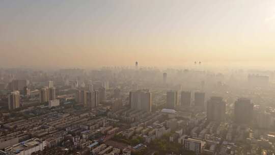 中国河南郑州清晨日出晨雾城市风光航拍