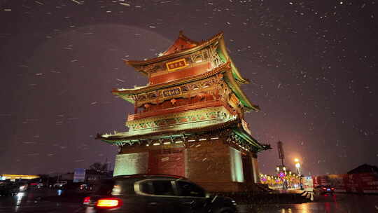 山西大同古城鼓楼夜景飘雪下雨雪景