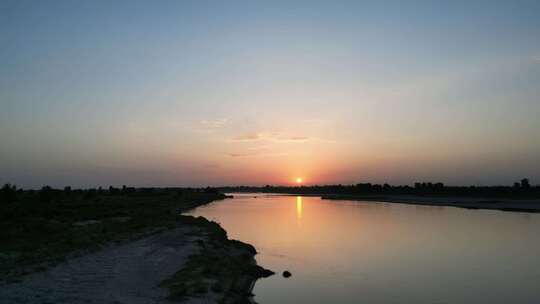 西安夕阳河滩黄昏日落晚霞渭河黄河流域航拍