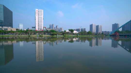 广州南沙蕉门河车行桥与城市摩天大楼建筑视频素材模板下载