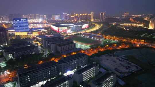 航拍扬州西区夜景明月湖商圈楼宇道路延时