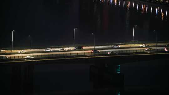 【4K】夜晚城市江面大桥车辆行驶远景视频素材模板下载