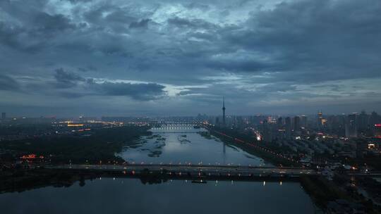 城市航拍洛阳阴雨天后城市云海夜景建筑