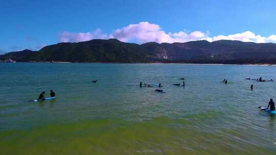 航拍三亚后海皇后湾冲浪及海棠湾海岛海浪