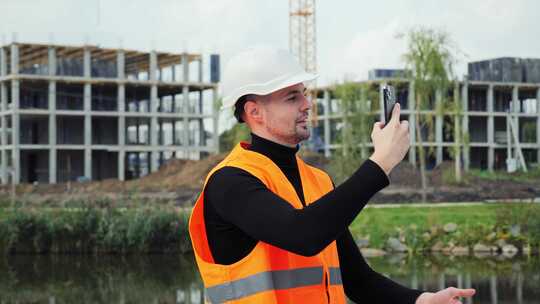 有手机拍摄工作的建筑承包商完成施工报告