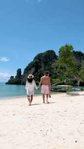 泰国热带白色海滩上的一对男女Koh Hong Island Krabi