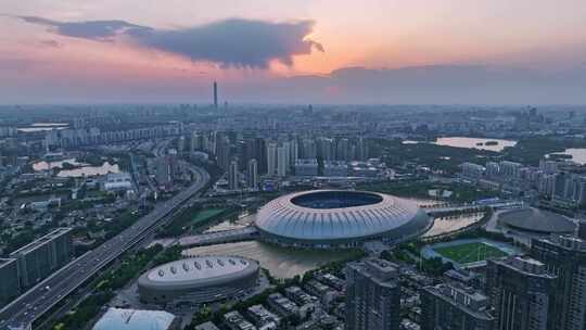 航拍天津水滴体育场晚霞