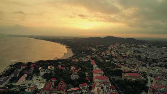 青岛海边夕阳城市航拍