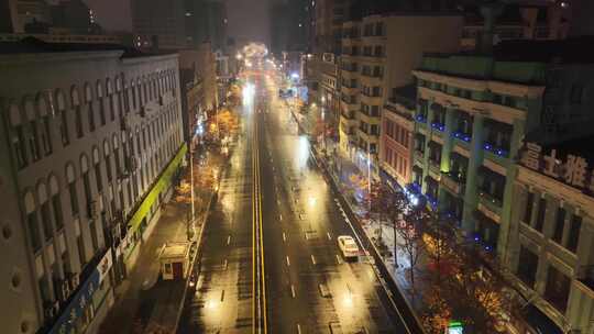 冬季航拍黑龙江省哈尔滨市大雪纷飞的街道