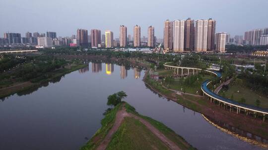 航拍湖南衡阳陆家新区城市夜景人行观光桥