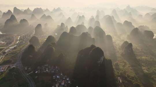 航拍桂林山水晨光中的山峰