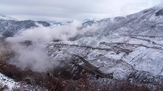 4K怒江72拐雪景云雾延时