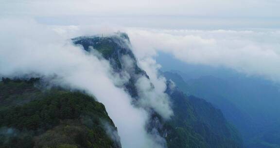 航拍峨眉山金顶云雾缭绕山崖陡峭